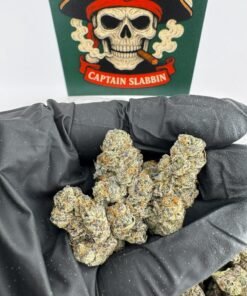 Mother's Milk cannabis flower strain with frosty trichomes and dense premium buds